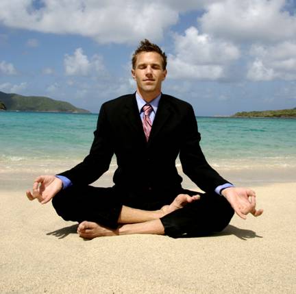 man-doing-yoga-in-business-suit-on-beach-copy.jpg